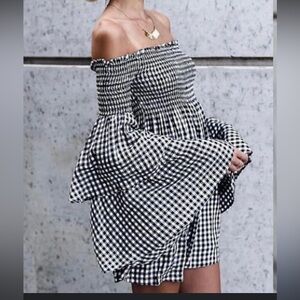 Venus, black and white gingham mini romper, bell sleeves